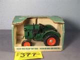 Farm Toy JLE "Deutz Diesel" Antique Series MIB
Fabulous authentically scaled die cast model / replica JLE Series "Deutz Diesel" tractor from the JLE Antique Series, manufactured by Scale Models. Dark green body with orange wheel hubs & black rubber tires. Item appear to be in mint condition in its original box. Tractor originally displayed in a non smoking pet free home.