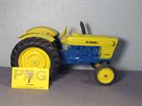 Farm Toy ERTL Ford 4400 Industrial Model Tractor
Awesome authentically scaled die cast model / replica ERTL "Ford 4400 Industrial" model tractor, blue & yellow coloration, rubber tires, steerable front end. Item is in good condition, slight paint chipping on rear fenders, previously displayed in a non smoking pet free home.