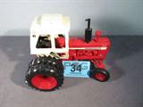 Farm Toy ERTL "Farmall Turbo International 1256"
Fantastic authenticall scaled die cast model / replica ERTL "Farmall Turbo International 1256" with enclosed cab. Red body, off white detailing and black rubber tires. In awesome condition, was previously on display in a non smoking pet free home