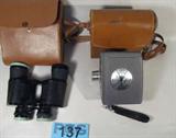 Empire Binoculars & DeJur 8mm Movie Camera
A vintage lot which includes:
- A DeJur Eldorado 8mm movie camera which appears to be in its original leather carrying case.
- A nice pair of Empire binoculars, 7 x 35, Featherlite model. Appears to be in the original leather carrying case.