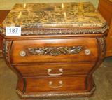 Furniture 3-Drawer Cherry Nightstand w/ Marble Top
A gorgeous nightstand made of cherry with a pretty Italian style marble top. Two drawers have pull handles and the top drawer has knobs. Ornately carved trim adds to the overall elegance of this piece. Marble has a scratch in the top. Measures 31" tall x 28" across x 17" in depth.
ZB4487