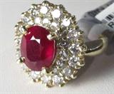 Jewelry 14K Yellow Gold Ruby & Diamond Ring GLA
A dazzling 14KT yellow gold, ruby & diamond ring. Included GLA Premium Appraisal Report reads:
"One lady's polished, stamped & electronically tested solid 14K yellow gold ring mounted with a Genuine Ruby (Corundum) center stone, high-lighted by 32 Genuine Diamonds. This item weighs 8.2 grams & fits a finger size 5.00. The setting measures 19.07 x 18.38 mm and the band measures 3.07 mm tapering down to 2.63 mm at the center of the shank. The condition is BRAND NEW. The gemstones have been analyzed in the mounting.
MAIN GEMSTONE
Identity: Genuine Ruby (Corundum)
Shape: Oval (faceted)
Dimensions: 9.84 x 7.95 x 5.68 mm
Quantity: 1
Carat weight: 4.13
Clarity: II = may include eye-visible features
Hue: Red
Transparency: Translucent
Tone: Medium - Dark
Saturation: Moderate
Polish: 7 - Very Good
Finish: 6 - Good - Very Good
Quality: 6 - Good to Very Good
ADJACENT GEMSTONES
Identity: Genuine Diamond
Cut: Round Full (faceted)
Dimensions 2.60 (no