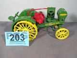 Farm Toy John Deere "Waterloo Boy" w/ Fuel Tank
Fantastic authentically scaled die / steel cast model / replica "John Deere Waterloo Boy" tractor w/ fuel tank on the front. Classic green & yellow John Deere coloration, red engine. Item is in remarkable condition. Previously displayed in a non smoking pet free home.