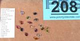 Jewelry Lot of 17 Loose Unmounted Gemstones
Consignor states the following stones are included in this lot: Vesuvianite, Yellow Tourmaline, Garnet, Aquamarine, Pink Tourmaline, Rubellite, Imperial Topaz, Peridot, Tanzanite, Citrine, Tsavorite, Amethyst, Blue Topaz, Golden Beryl, Rhodolite, Sapphire, Lolite.
Gorgeous pieces! Perfect for jewelry making!
Tag words: Mineral, Stone, Loose unmounted gemstone.