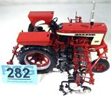 Farm Toy "Farmall 504" Tractor / Cultivator
Awesome authentically scaled die cast model / replica "Farmall 504" tractor / cultivator. Includes flat rear fenders, four row front mounted #468 cultivators and detachable cultivators on the back. Fire engine red body with off - white & black detailing. Item is in fantastic condition, previously displayed in a non smoking pet free home.
ZB2594