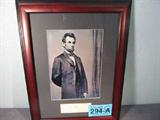 Abraham Lincoln Autograph w/ Framed Photo ACE
Own your own piece of history with this beautifully framed photo print of Abraham Lincoln which has his hand written signature beneath the photograph. The signature is certified by Autograph Certification Experts, LLC, Justin Chris Priddy, President. Certification # B40352 can be verified at www.autographcertificationexperts.com.
Information provided by the consignor: "Abraham Lincoln (February 12, 1809 – April 15, 1865) was the 16th President of the United States, serving from March 1861 until his assassination in April 1865. He successfully led his country through a great constitutional, military and moral crisis – the American Civil War – preserving the Union, while ending slavery, and promoting economic and financial modernization. Reared in a poor family on the western frontier, Lincoln was mostly self-educated. He became a country lawyer, an Illinois state legislator, and a one-term member of the United States House of Representatives