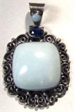 Jewelry Sterling Silver Fashion Pendant
Gorgeous sterling silver pendant featuring large green / blue colored stone, possibly Chalcedony, also accented with dark blue stone, possibly Sapphire. Measures: 2.5" long, marked "925 BA Indonesia". Total weight: 1.10 ozt.