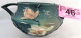 Vintage Roseville "Magnolia" Pottery Hanging Bowl
Beautiful Roseville Pottery hanging bowl in the "Magnolia" pattern. This pattern was produced around the 1940s. In nice condition with some minor crazing! Measures 5.5" height x 11" across from handle to handle.
