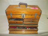 Vintage Wooden Tool Box W/ Tools
A machinist wooden tool box packed full of vintage tools. Starret Gauges in wood boxes, Micrometers, Brown & Sharpe Calipers, Jigs, and blocks. A great collection. The tool box is a time capsule of the past. Very heavy and loaded with precision tools. Box measures 20" across and 14" tall. Box is in great condition for its age.