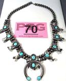 Jewelry Sterling Silver Squash Blossom Necklace
Gorgeous sterling silver Southwestern style squash blossom necklace. Featuring large Naja pendant accented with 4 polished turquoise stones, necklace is also decorated with 8 turquoise stones. Measures: 19" long, total weight: 2.5 ozt.