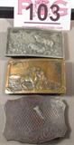 Jewelry Lot of 3 Western Style Belt Buckles
A great lot of 3 western style belt buckles includes:
- A silver color buckle featuring a scene with Elk on the front. Buckle is marked "Burgandy Brass Works Co."
- A copper color buckle which features a scene of a cowboy roping a calf. Unmarked.
- A bronze color buckle with paisley designs. Unmarked.