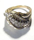 Jewelry 14kt Yellow Gold Diamond Cluster Ring
Fabulous 14kt yellow gold cluster ring featuring round brilliant cut and baguette cut diamond stones. Marked "14k", ring size: 8.5. Total weight: 3.3 dwt.
