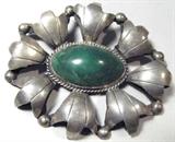 Jewelry Large Sterling Silver Brooch / Pin
Fantastic large sterling silver brooch with oval shaped green colored stone, possibly Malachite. Marked "Made in Mexico", measures: 2.75" wide x 2.5" tall. Total weight: .92 ozt.