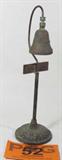 Vintage Cast Metal El Camino Mission Bell
A vintage cast metal bell on a metal guide post. Marked "1769 - 1906 El Camino Bell". Items is rusty and shows signs of wear from age. Measures approximately 9" tall.
From the internet: "El Camino Real (Spanish for The Royal Road, also known as The King's Highway) and sometimes associated with Calle Real usually refers to the historic 600-mile (966-kilometer) California Mission Trail, connecting the former Alta California's 21 missions (along with a number of support sites), 4 presidios, and several pueblos, stretching from Mission San Diego de Alcalá in San Diego in the south to Mission San Francisco Solano in Sonoma in the north."