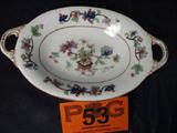 Antique Coalport Cabinet Dish Flowerpot Pattern
A beautiful antique cabinet dish made by Coalport of England. Trademark on bottom of dish indicates that the piece was produced between 1891 and 1920. Beautiful Flowerpot pattern number 6071. Dish measures 9" long.