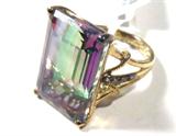 Jewelry Mystic Topaz Sterling Silver Ring
Fabulous sterling silver gold washed ring featuring a large multicolored stone, consignor states this is a Mystic Topaz. Ring is also accented with 8 small round diamond stones. Marked "925", ring size: 7.5. Total weight: .34 ozt.