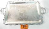 Silver Plated Serving Tray w/ Handles
A very large silver plated serving tray, American Rose pattern, made by Wilcox Silver Company. Molded metal handles on each end for easy carrying. Measures 15.5" across and 26.5" in length.