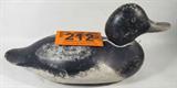 G.E. Barker Wooden Duck Decoy Glass Eyes
A vintage black and gray duck decoy which appears to have orange glass eyes. A metal plate on the bottom is stamped "G.E. Barker". Measures approximately 13" long an 6.5" tall.