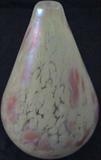 Mount St Helen Ash Glass Vase Signed
A lovely bud vase which is tear drop shaped featuring a pretty pink and white opalescent design. The bottom is marked "MSH ASH (unknown word)". Measures 4.5" tall.