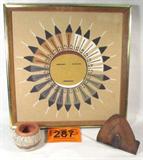 Mixed Lot Southwestern Sand Painting / Pottery +
Enhance your southwestern style decor with this lot of three decorative items:
- Small earthenware pottery vase, appears to be hand painted. Measures 2.5" tall. Unmarked.
- A Drumgold hammered copper bookend. Measures 3.75" tall.
- A framed Navajo style sandpainting. Measures 13" x 13". Unmarked.