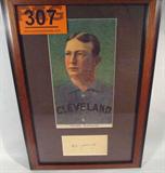 Cy Young Autograph & Framed Print ACE
This lot contains a reproduced color copy of a vintage baseball card. Just below the photo is a piece of paper with Cy Young's autograph. Frame measures 15.75" x 11". Photograph and signature have been professionally matted and framed. Signature is certified by Autograph Certification Experts, LLC, Justin Chris Priddy, President. Certification # B36805, can be verified at www.autographcertificationexperts.com.
From the internet: "Denton True "Cy" Young (March 29, 1867 – November 4, 1955) was an American Major League Baseball pitcher. During his 22-year baseball career (1890-1911), he pitched for five different teams. Young was elected to the National Baseball Hall of Fame in 1937. One year after Young's death, the Cy Young Award was created to honor the previous season's best pitcher. Young established numerous pitching records, some of which have stood for a century. Young compiled 511 wins, 94 ahead of Walter Johnson, who is second on the list of
