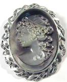 Jewelry Sterling Silver Abalone Cameo Brooch
Gorgeous sterling silver cameo brooch / pin with abalone shell insert. Accented with sparkly Marcasite stones around carved profile of a lovely lady. Marked "925", measures: 2" long x 1.5" wide. Total weight: .15 ozt.