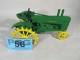 Farm Toy JLE "John Deere Model 'A' " Tractor
Awesome authentically scaled die cast model / replica JLE "John Deere Model A" from the World AG Toy Show of 1992. Classic John Deere green & yellow coloration, yellow steel wheels, serial #0082. In fantastic condition. Previously displayed in a non smoking pet free home.