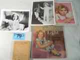 Mixed Lot Shirley Temple Pictures & Books
Who didn't love this little curly top who could sing and dance at such a young age? Here is a collection of items that will bring back those memories of yesteryear.
- A book published in 1936, "My Life and Times" by Shirley Temple. Saalfield Publishing Company. Book does not have a cover.
- A book published in 1937, "Now I am Eight" by Shirley Temple. Saalfield Publishing Co., authorized edition No. 1766. Book is worn from age and use.
- An advertisement flyer for the Vassar Waver curler made by W.J. Caley and Co., Inc. Reverse side of advertisement has a pictured of Shirley Temple and is captioned, "To My Friend"........
- Two 8x10 black and white photographs of Shirley Temple which appear to be scenes from two of her movie roles.