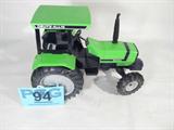 Farm Toy "Deutz - Allis 6240" Die Cast Tractor
Awesome authentically scaled die cast model / replica "Deutz - Allis 6240" tractor, unknown maker. Features a partially enclosed cab, rear hitch, & rubber tires. Lime green body with black detailing. In terrific condition. Previously displayed in a non smoking pet free home.