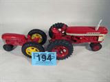 Farm Toy Lot of 2 Farmall / Massey Harris Tractors
Lot of 2 model tractors:
- Awesome authentically scaled die cast model / replica "International Harvester Farmall 560", red body with black rubber wheels. In great condition.
- Wonderful 6 3/4" long die cast model / replica "Miscellaneous Massey Harris" tractor. Paint chipping in several places.
Both items in this lot previously displayed in a non smoking pet free home.