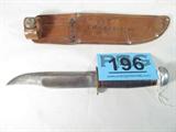 Marble's Gladstone Hunting Knife w/ Sheath
An old Marble's Gladstone hunting knife with a 6" blade that is marked "Marble's Gladstone, Mich., USA". Appears to be in the original leather sheath, snap is marked Marble's Gladstone. Entire length of knife is 10". Sheath has been engraved "CH. Garbrecht".