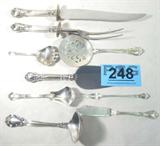 Sterling Gorham Flatware Unknown Pattern
Beautiful sterling silver flatware made by Gorham. Pattern is unknown. Serving pieces included:
- Large carving set with stainless steel blade and prongs, measures: 13" long.
- Master butter spreader, measures: 6.75" long.
- Gravy ladle, measures: 6.75" long.
- Pickle fork, measures: 5.75" long.
- Pie / cake server with stainless steel blade, measures: 10" long.
- Pierced serving piece, possibly a tomato server, measures: 7.5" long.
- Sugar shell, measures: 6" long.
- Pierced serving spoon, measures: 4.75" long.
Total weight: 20.39 ozt.
Items with stainless steel separately weigh: 12.74 ozt.
To complete you set see lots: 64, 146, 248 and 338.
#2448-9861
Tag word: Sterl925
