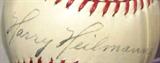 Harry Heilmann Autograph Baseball AAU Certified
A Spalding brand baseball which is hand signed Harry Heilmann baseball. Presented in a clear acrylic ball holder. Signature is certified by Authentic Autographs Unlimited, Serial #A13971. The Certificate of Authenticity is signed by Drew V. Max, a Court Qualified and Board Certified Forensic Document Examiner and handwriting expert who specializes in celebrities, sports, and antiquities. You may have seen Mr. Max on the reality television show "Pawn Stars".
From the internet: "Harry Edwin Heilmann (August 3, 1894 – July 9, 1951), nicknamed “Slug,” was a Major League Baseball player who played 17 seasons with the Detroit Tigers (1914, 1916–1929) and Cincinnati Reds (1930, 1932). He was elected to the Baseball Hall of Fame in 1952. Heilmann was a line drive hitter who won four American League batting crowns: in 1921, 1923, 1925 and 1927. He and Ted Williams are the last two American League players to hit .400, Heilmann having accomplished