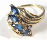 Jewelry 14k Yellow Gold Blue Gemstone Fashion Ring
Gorgeous 14kt yellow gold fashion ring featuring 5 marquise shaped blue colored stone and 2 small diamond stones. Marked "14k", ring size: 7.5. Total weight: 2.9 dwt.
#2448-9201-CFSG48420