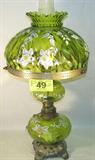Vintage Hurricane Parlor Table Lamp Electric
A beautiful Gone With the Wind style electric table lamp with stunning green glass shades which appear to be hand painted. Measures 31" tall.