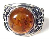 Jewelry Sterling Silver Cognac Amber Ring
Beautiful sterling silver ring featuring a cabochon Cognac Amber stone. Ring has lovely filigree design around band. Marked "925, size: 8.5. Total weight: .16 ozt.