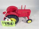 Farm Toy Massey Harris Red Die Cast Tractor
Awesome authentically scaled die cast model / replica "Massey Harris" general purpose tractor, unknown maker / manufacturer. Wide front wheels, wide-crop style, red body, rubber tires. In fantastic condition, name stickers peeling slightly. Previously displayed in a non smoking pet free home.