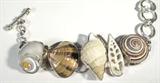 Jewelry Charles Albert Sterling Silver Bracelet
Gorgeous sterling silver bracelet featuring 5 natural colorful seashells. Bracelet completed by ring and bar style clasp. Marked "Charles Albert sterling", measures: 6.5-8" long. One shell appears to have a small chip. Total weight: 1.98 ozt.