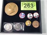 U.S. President / Army General Buttons & Medallions
Lot contains:
- Metal medallion commemorating John F. Kennedy's Inauguration, Jan. 20, 1961. Measures 3" in diameter.
- A double eagle Presidential commemorative coin dated 1984 for 40th President Ronald Reagan.
- A double eagle Presidential commemorative coin dated 1988 for 41 st President George W. Bush.
- A commemorative medallion in honor of Harry S. Truman and featuring the Minnesota Territorial Centennial in July 1949.
- A William McKinley pin made by The Whitehead & Hoag Company.
- A President Harry S. Truman pin.
- A General George S. Patton, Jr. pin.
- A General Douglas MacArthur pin.
Z14
