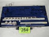 W. T. Armstrong Sterling Silver Flute Model 90
Fabulous W. T. Armstrong Model 90 flute musical instrument with sterling silver body and head. Unknown in pads will seal properly, may need to be replaced. All keys, springs, and pads are included. Comes in carrying case with metal cleaning rod.