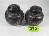 Lot of 2 Vintage Cloisonne Vases w/ Lid China
Two beautiful vintage Cloisonne Vases that each stand 5.5" tall. Both have dome style lids. Very nice condition with lovely floral design on a brown background. Appears to be very old and not reproductions. Bottom of each vase is embossed "China".