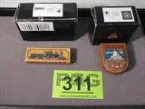 Lot of 2 Olszewski Disneyland Decorative Boxes
Darling Disneyland themed decorative trinket boxes:
- Disneyland Railroad, measures: 3.25" long x .75" tall.
- "Matterhorn" bobsled ride, measures: 2.25" long x .75" tall.
Each box is designed to look like a carved wooden box but is actually resin. Original boxes are included.