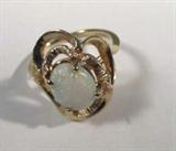 Jewelry 14kt Yellow Gold Opal Ring
Gorgeous 14kt yellow gold ring featuring a large, oval shaped, prong set, opal stone. Marked "14k", ring size: 6.25. Total weight: 2.4 dwt