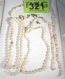 Jewelry Faux & Real Pearl Necklaces Bracelets More
Mixed lot of pearl & faux pearl jewelry:
- Lovely strand of faux pearls graduating in size from the clasps to the center. Gold washed / colored clasp marked / signed "Monet". Measures 23.25" long.
- One loose genuine pearl, off-white in color.
- Gorgeous long single strand of genuine pearls with a 14K yellow gold hook style clasp, marked / signed "14K PJS". Off white in color, fairly uniform looking pearls. Measures 30.5" long.
- Beautiful single strand of baroque pearls, varying shapes and colors among which are pale pink, pale yellowish, & off white. Gold washed / filled hook clasp, marked / signed "14 / 20". Measures 16" long.
- Beautiful clip on earrings each featuring a genuine pearl, gold filled flattened discs that look like flowers or opening of an oyster shell. Marked / signed "1/20 14K GF."
-More!