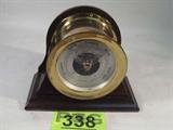 Brass Chelsea Ship's Bell Holosteric Barometer
A vintage Chelsea Holosteric Barometer. Brass barometer sits in a wooden bell shaped base. Measures 6.5" tall x 8" wide x 3.75" deep