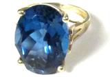 Jewelry 10kt Yellow Gold London Blue Topaz Ring
Stunning 10kt yellow gold ring featuring a large oval shaped faceted deep vivid blue colored stone in prong setting. Consignor states this stone is a London Blue Topaz, approximate: carat weight: 9 carats. . Marked "10k", ring size: 8.5. Total weight: 4.0 dwt.