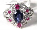 Jewelry Sterling Silver Iolite Fashion Ring
Beautiful sterling silver fashion ring featuring a large oval shaped Iolite stone in prong setting. Also accented with pink and clear colored stones. Marked "925", ring size: 6.25. Total weight: .11 ozt.