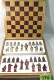 Roman Chess Set Oak Case & Board w/ Resin Chessmen
A fantastic vintage chess set. Case appears to be solid oak. Chessmen are stored inside and game board sits on top. Carved resin chess pieces represent Roman figures of men and women, fierce lions, and stately horses. Board and case measure 18" x 18". Chess pieces measure from 2.25" to 4" tall. Would make a great gift. Consigner states that the item was purchased in Guam in the 1980s.