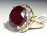 Jewelry 14K Yellow Gold Ruby & Diamond Ring
Dazzling 14K yellow gold ruby & diamond ring. Included GLA Premium Appraisal reads:
"One lady's polished, stamped and electronically tested solid 14K yellow gold ring mounted with: 1 Genuine Ruby (Corundum) and 20 Genuine Round Full Diamonds. This item weighs 7.75 grams and fits a finger size 6.50. The setting measures 18.43 x 17.78 mm and the band measures 2.10 mm tapering down to 1.48 mm at the center of the shank. The condition is BRAND NEW. The gemstones have been analyzed in the mounting.
MAIN GEMSTONE
Identity: Genuine Ruby (Corundum)
Shape: Oval (faceted)
Measurements: 14.20 x 12.90 x 8.00 mm (est.)
Quantity: 1
Carat weight: 14.29 cts (est.)
Clarity type: II = may include eye-visible features
Hue: Cabernet Red
Transparency: Translucent
Tone: Dark
Quality: 5 - Good
ADJACENT GEMSTONE
Identity: Genuine Diamond
Cut: Round Full (Faceted)
Measurements: 2.40 - 2.30 mm (no depth) (Range)
Quantity: 20
Carat weight: 0.96 ctw (est)
Clarity Grade