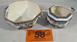 Lot of 2 Royal Doulton Merryweather Bowl & Pitcher
A beautiful vintage cream pitcher and sugar bowl in the blue and yellow "Merryweather" pattern made by Royal Doulton. Both pieces have the trademark stamp on the bottom. Pitcher measures 2.25" tall and the sugar bowl is 2.5" tall.
ZB989